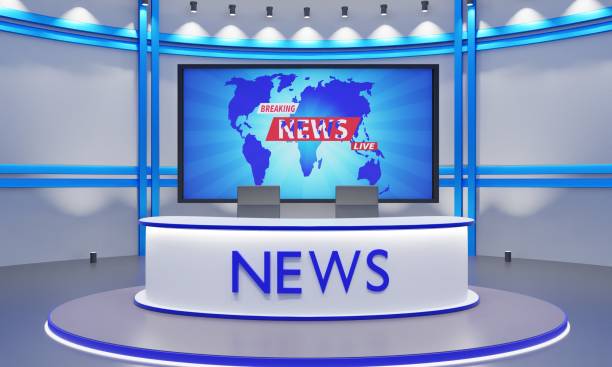 istock white table on stand with led screen background in the red news studio room.3d rendering. 1419792666
