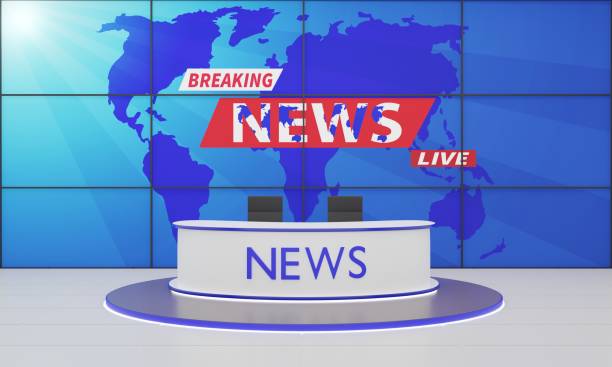 istock white table on stand with led screen background in the red news studio room.3d rendering. 1419792810