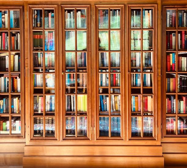 istock Library behind glass doors 1419796028