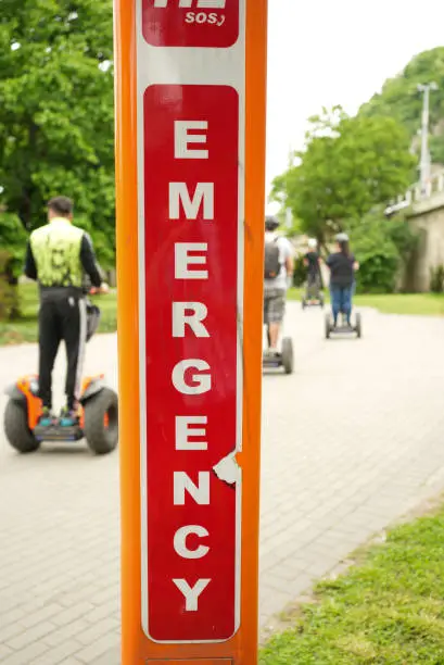 Segway passing and emergency sign in the streets