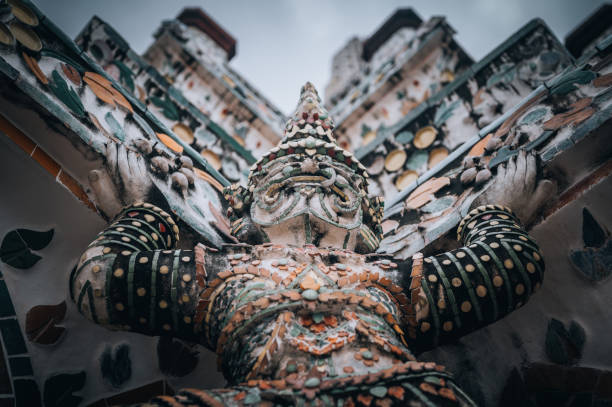Low angle view of the guardian demon statue at Wat Arun, Thailand