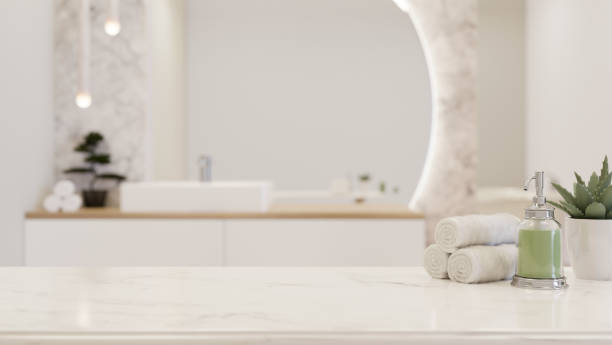 istock White luxury marble tabletop with copy space over blurred white elegance bathroom background 1419810525