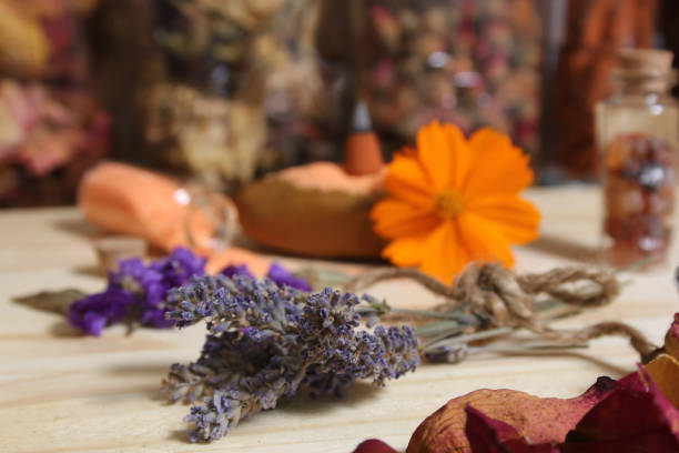 Incense Cones on Stone Slab With Rock Crystals and Flowers