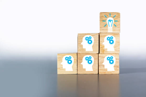 istock icon together to think until wisdom on wooden box light gray background 1419820343