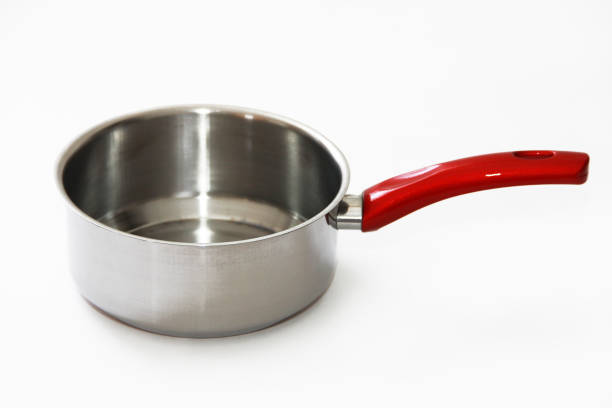 istock shiny metal ladle with red handle for cooking on a white background 1419823173