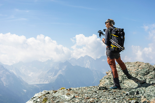 hiker mature man adventure in high mountain
