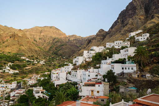 View of San Pedro white houses at the bottom of Tamadaba Rural Park in Agaete valley, Gran Canaria, Canary Islands, Spain