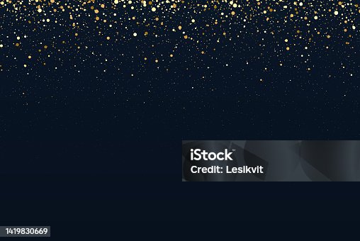 istock Falling particles of golden color on a dark background. Abstract design element for greeting card, New Year s invitation. 1419830669