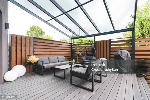 Outdoor Lounge Area On A Terrace Stock Photo - Download Image Now - Patio, Deck, Back Yard