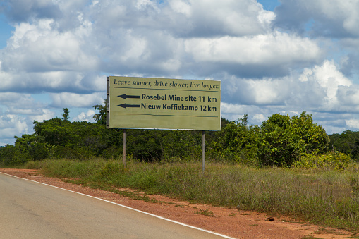 Road signs to some of the many gold mines near Brownsweg in the Amazonia Rainforest of Suriname. Brokopondo district, Suriname.