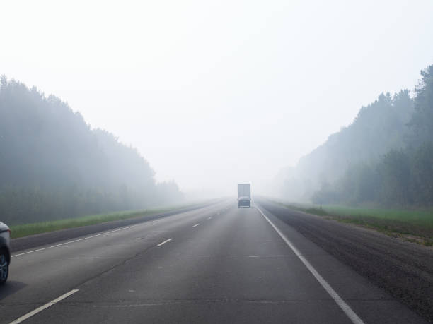 istock haze on road from burning forest smoke in morning 1419837411
