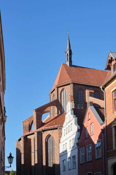Back of St. Nicholas Church in Wismar, Germany with blue sky.