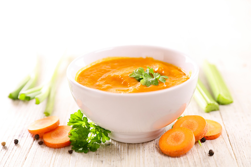 bowl of carrot and celery soup