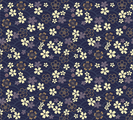 Cherry blossom, Japanese floral textile pattern on blue background with seigaiha elements.