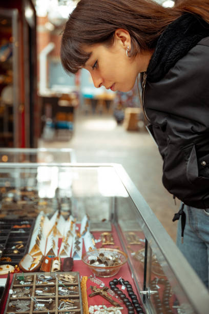istock Young woman looking market stall 1419848242