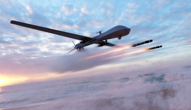 Military combat drone UAV launching missiles Military combat drone UAV launching missiles air attack stock pictures, royalty-free photos & images