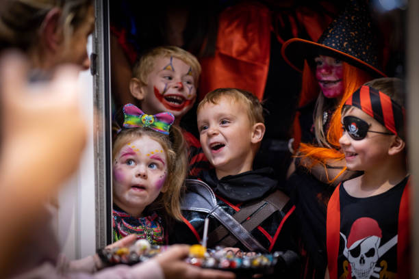 istock Group of Children Trick or Treating 1419851359