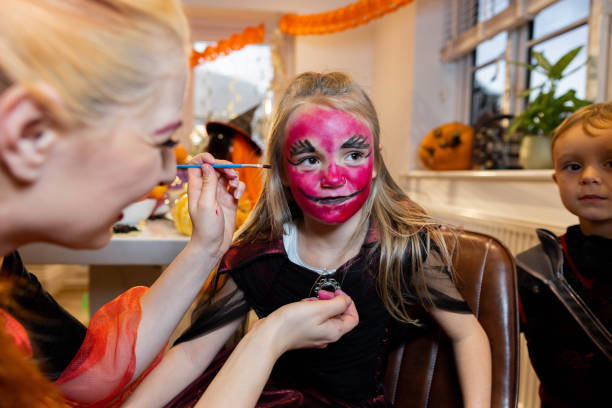 istock Painting Face For Halloween Party 1419851547