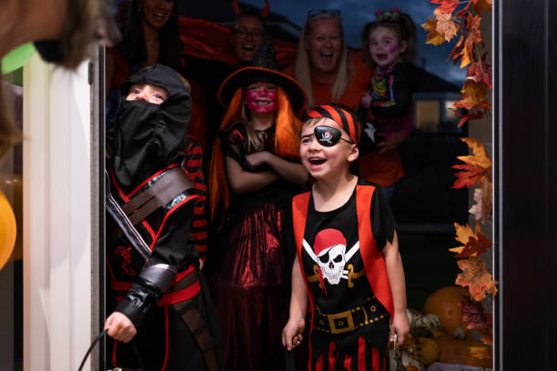 istock Trick Or Treating With Adults 1419851631