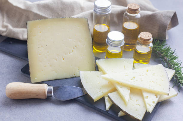 istock Appetizer of cured cheese with bread and olive oil 1419853321