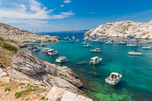 Sailboats anchored in a beautiful bay of Porto Katsiki, Lefkada, Greece on a misty day. Storm incoming from north