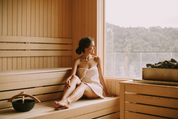 istock Young woman relaxing in the sauna 1419855017