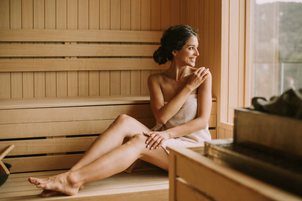 istock Young woman relaxing in the sauna 1419855026