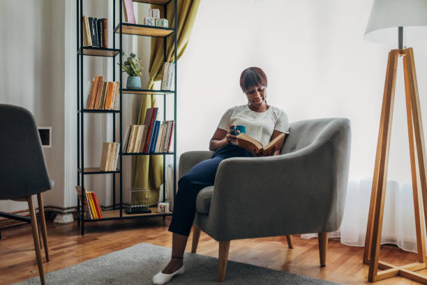 istock Woman enjoying in book 1419858918