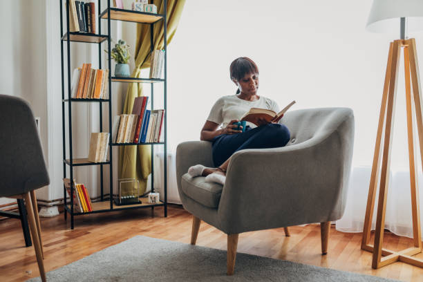 istock Woman enjoying in book 1419859072