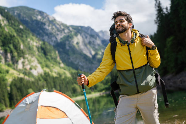 istock Active hiker hiking, enjoying the view, looking at mountain landscape 1419860533