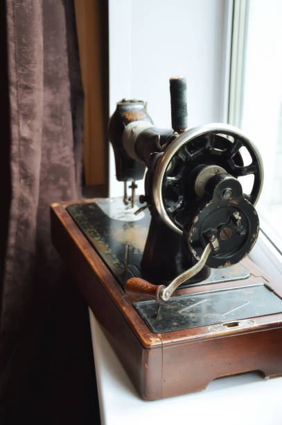 istock an old sewing machine. antiques, an old item. background for the design. 1419860754