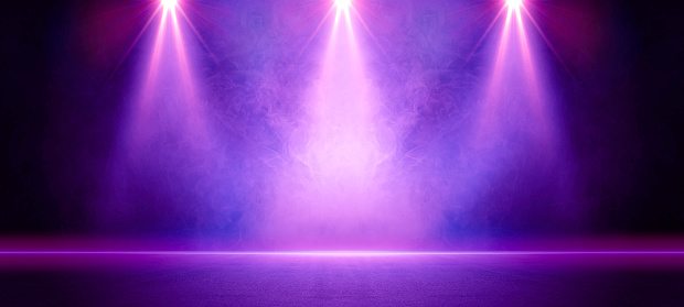 The dark stage shows, dark purple, multicolored background, an empty dark scene, neon light, spotlights The asphalt floor and studio room with smoke float up the interior texture for display products