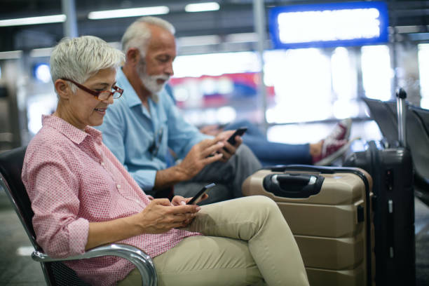istock Senior couple waiting for a train. 1419861168