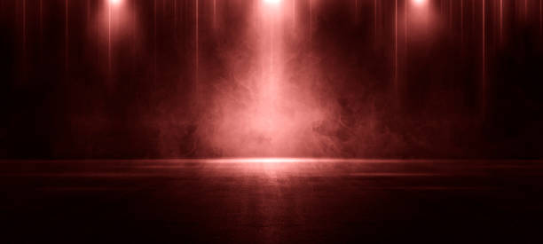 istock A dark empty street, dark red background, an empty dark scene, neon light, spotlights The asphalt floor and studio room with smoke float up the interior texture. night view 1419861231
