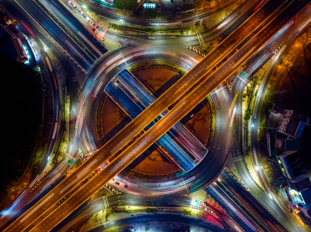 istock Time lapse of intersection circle. Busy traffic at night. 1419861381