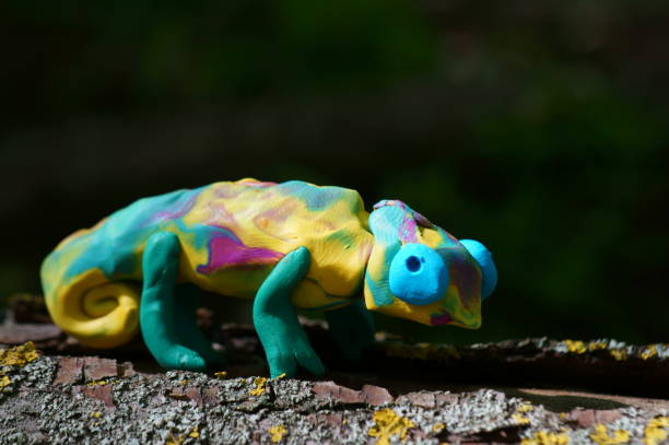istock Toy colored chameleon close-up. 1419862569