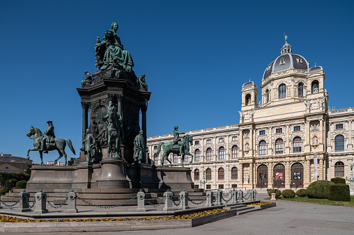 Vienna, Austria - April 7, 2021: The Museum of natural history and monument of Maria Theresia in Vienna (Austria) in springtime