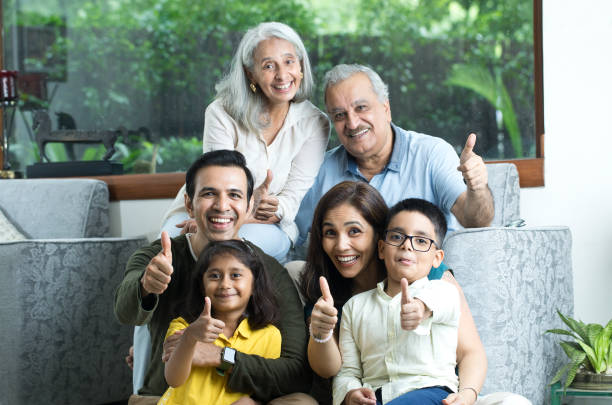 istock Multi-Generation Family Giving Thumbs Up Gesture 1419870514