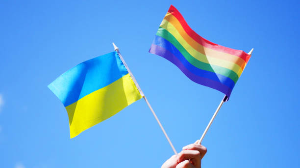 istock Ukraine and rainbow flags. Pride parade. 1419877636