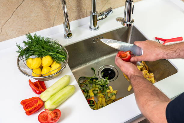 istock Tomato cutting, peeling and cutting fresh vegetables in the kitchen 1419878376