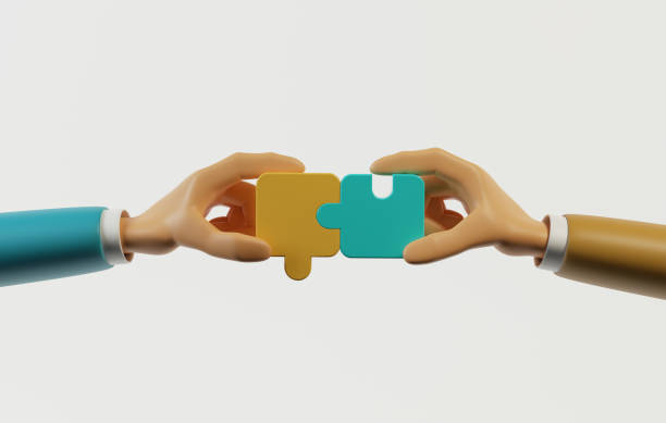 istock Businessman hands assembling jigsaw puzzles connecting people on white background. 1419880832