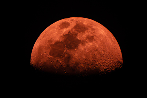 closeup of red moon from telescope for design purpose