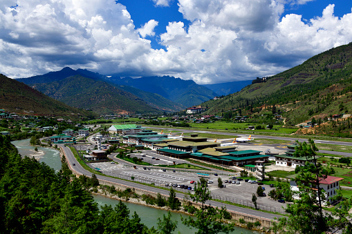Paro airport in the Paro Chhu valley, between the river and the mountains, gateway to Himalayan kingdom of Bhutan
