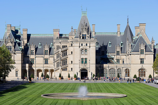 Asheville, North Carolina, USA - October 19, 2021: Tourists visiting the historic Biltmore mansion.