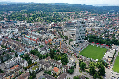 Aerial view over the city of Amsterdam and it's suburbs on the approach to Schiphol Airport in the Netherlands. The Ajax football stadium can be seen.