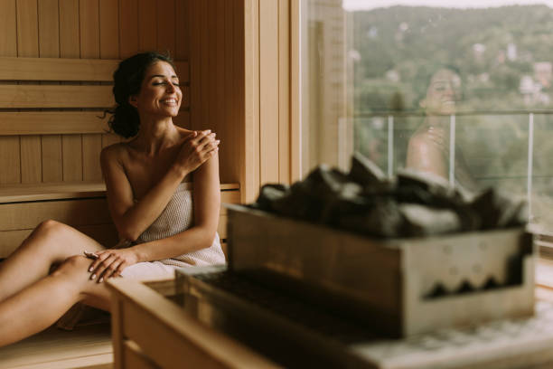 istock Young woman relaxing in the sauna 1419888026