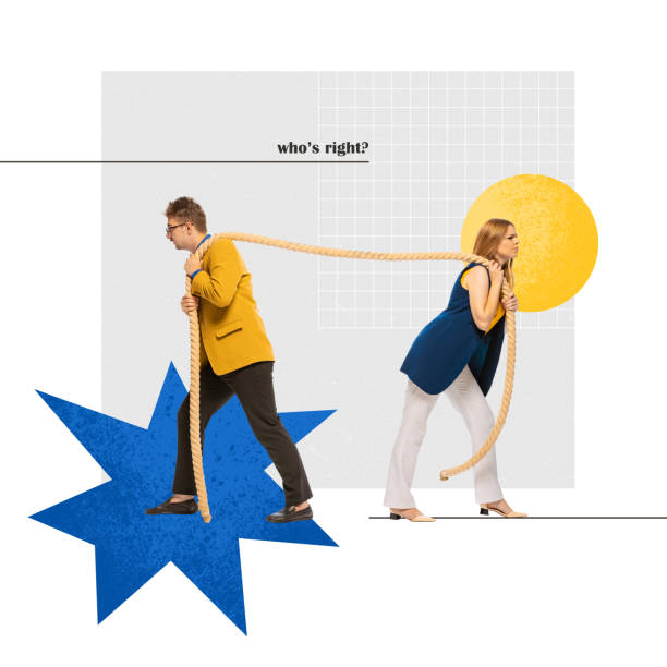 istock Contemporary art collage. Two stubborn employees pulling rope on opposite side trying to figure put who is right 1419890039