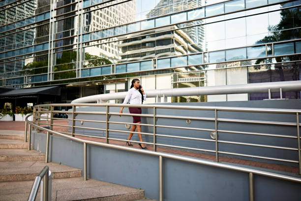 istock Miami corporate professional using smart phone outdoors 1419892205