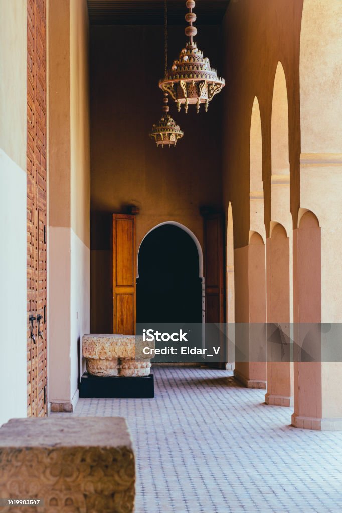 peaceful place a space of tranquility, with columns, doors and antique chandeliers of a palace in marrakesh Marrakesh Stock Photo