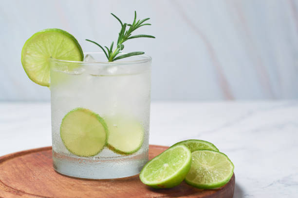 caipirinha or caipiroska, fresh brazilian cocktail - caipiroska imagens e fotografias de stock